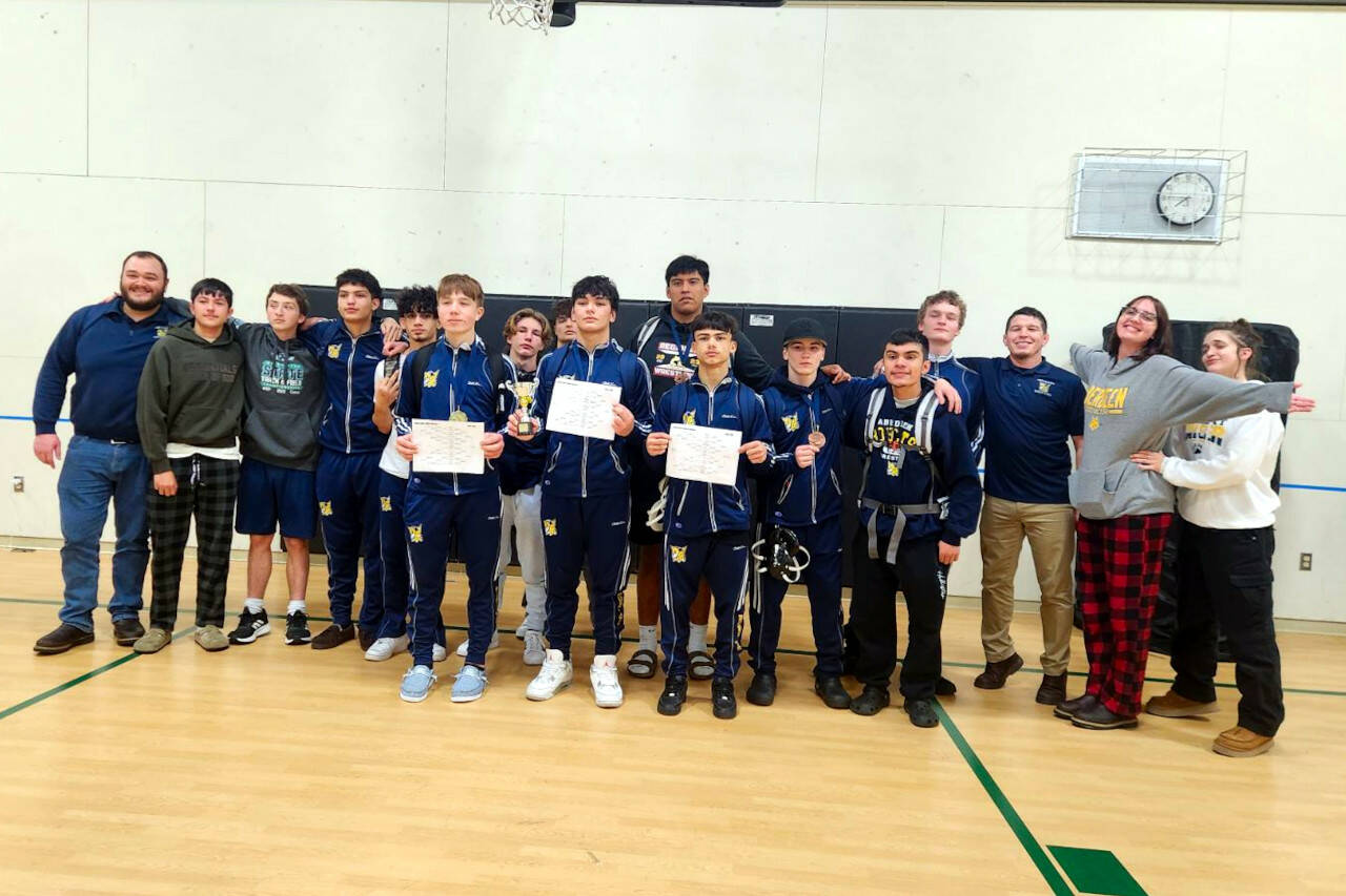SUBMITTED PHOTO A portion of the Aberdeen boys wrestling team poses with their third-place trophy earned at the River Ridge Rumble on Saturday in Lacey.