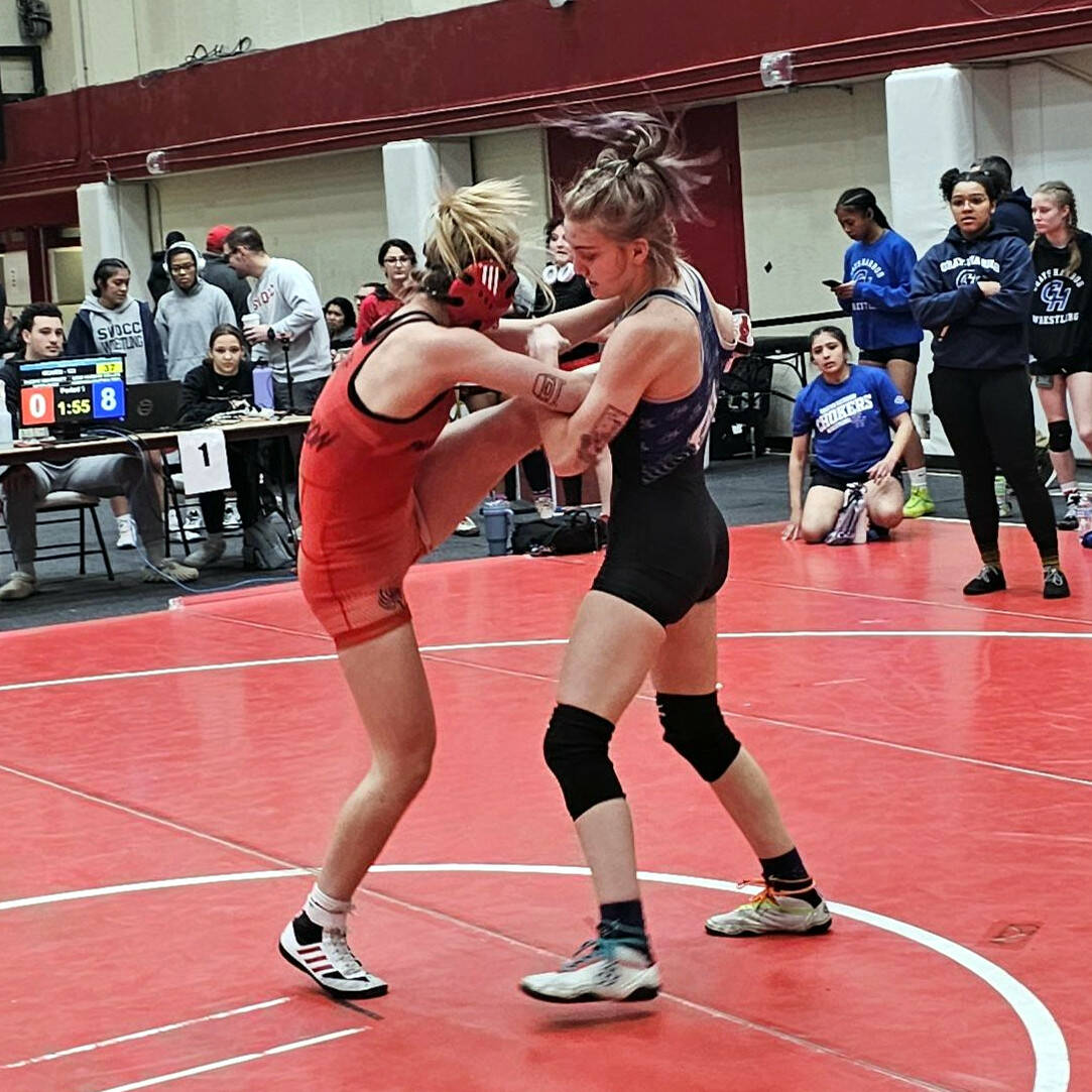 SUBMITTED PHOTO Grays Harbor College’s Alexandria Kauffman-Templeton, right, controls the leg of Pacific University’s Aurora Rager at the Boxer Open on Sunday in Forest Grove, Oregon.