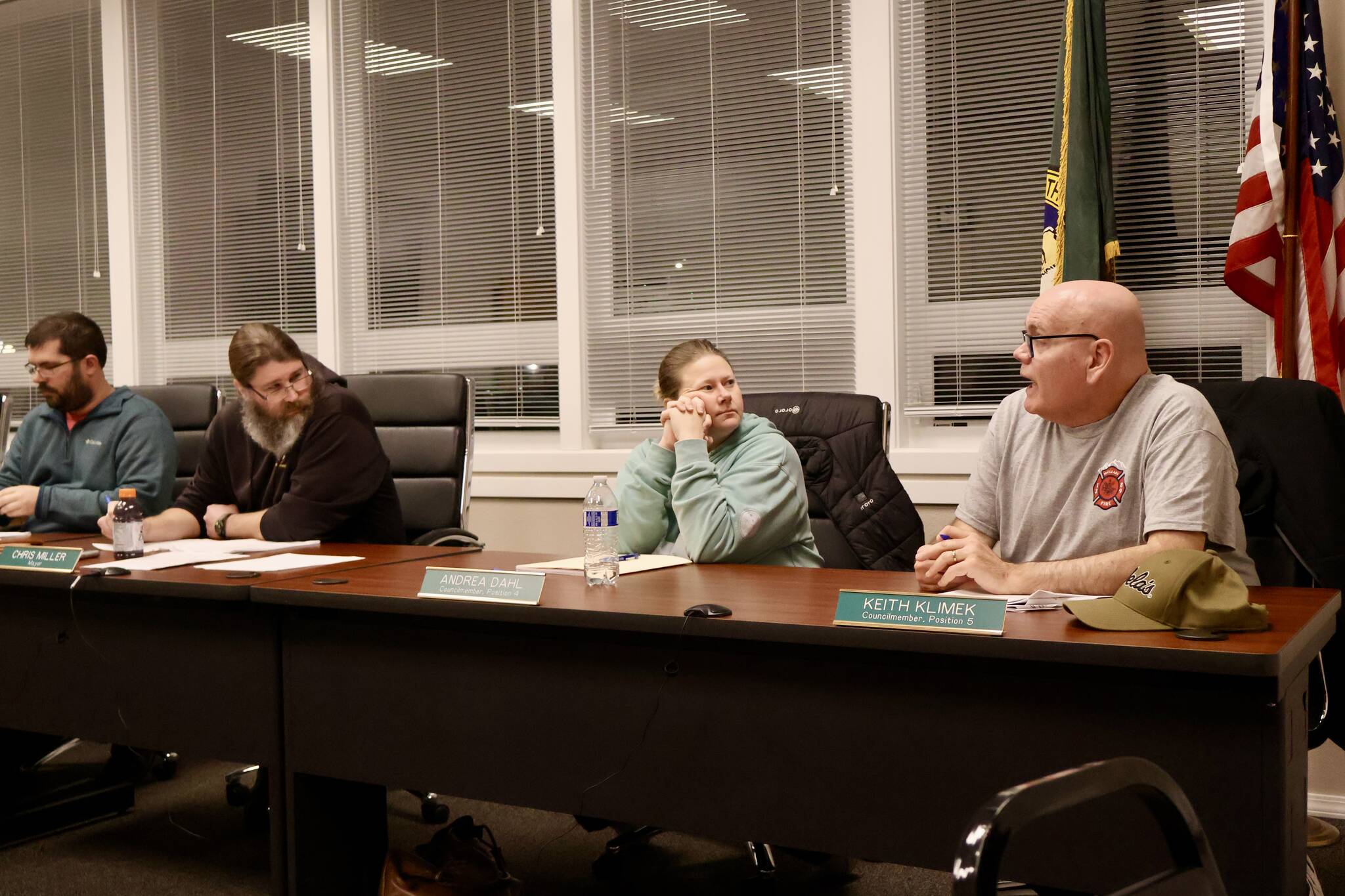 McCleary city council member Keith Klimek, right, speaks to the council about confirming the new fire chief during a city council meeting. (Michael S. Lockett / The Daily World)