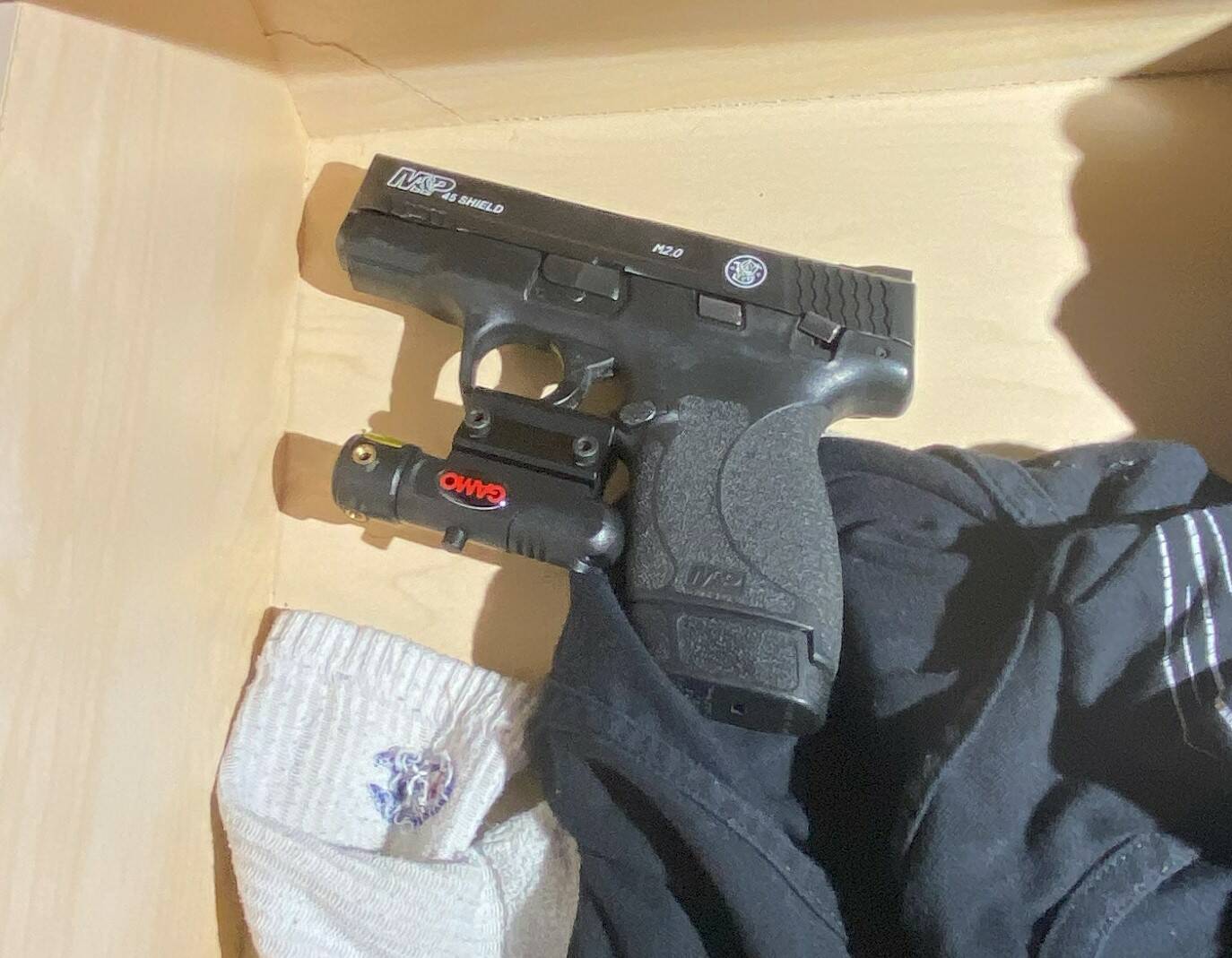 A handgun was recovered from the room of a juvenile suspect in a shooting on Thursday. (Courtesy photo / APD)