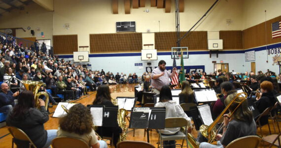Clayton Franke / The Daily World
The Miller Jr. High School band performs a debut of the “Miller March,” an original composition by former Miller student Gordon Shaw, at the school’s centennial celebration on Sunday, Jan. 28.