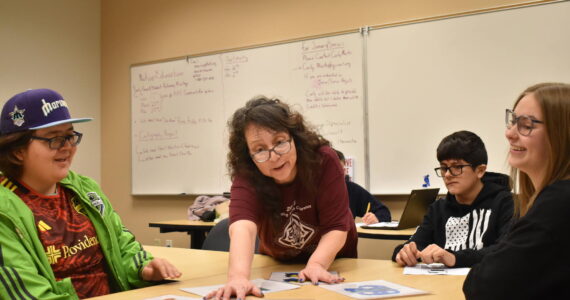Clayton Franke / The Daily World
Cosette Terry-itewaste, lead teacher and language developer for the Quinault Language Department, leads a lesson on Quinault language at Aberdeen High School on Friday, Feb. 2. Pictured are Aberdeen Native Education students Preston Williams, left, Max Meza, right-center, and Ellie Long, right.