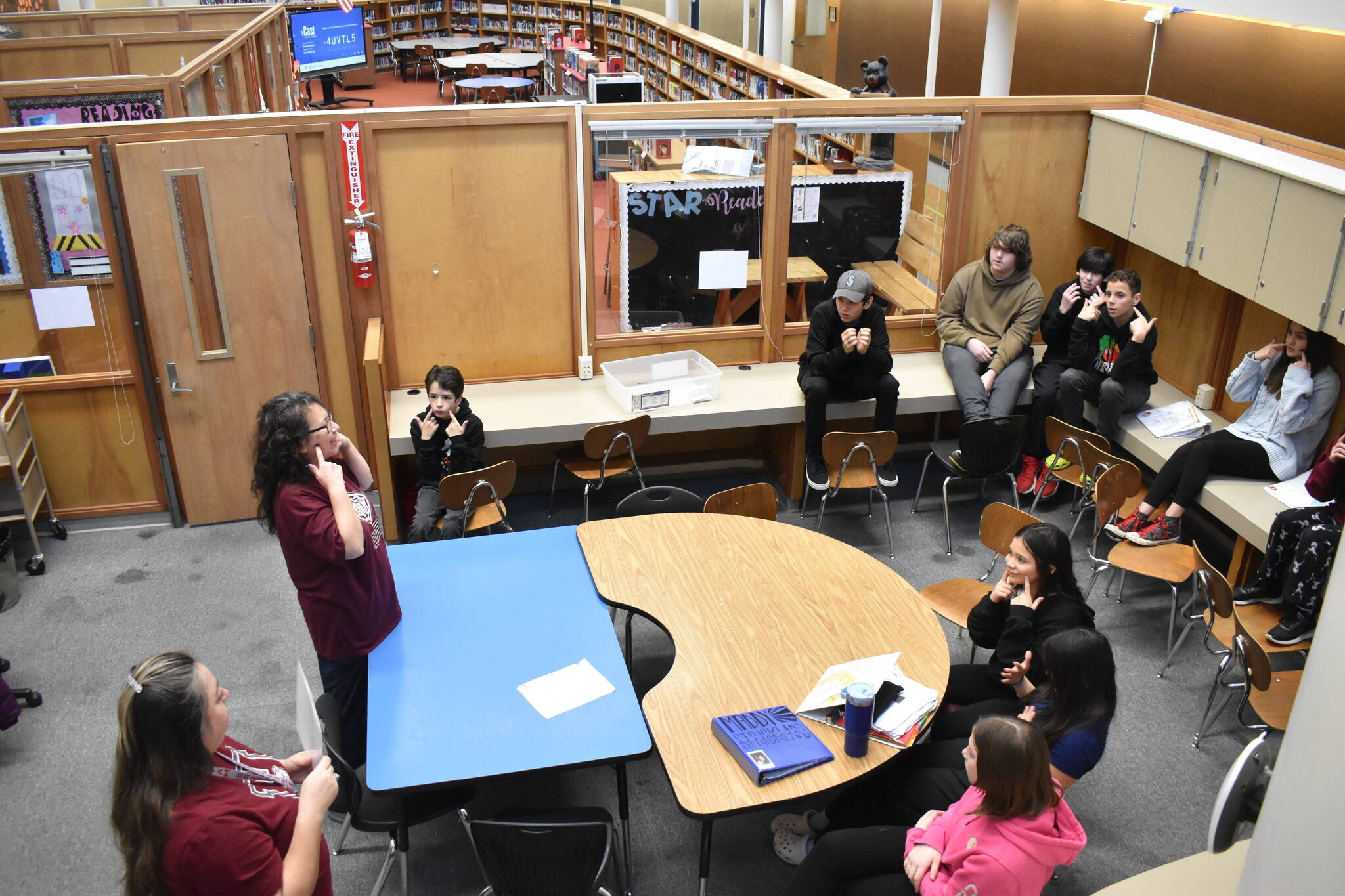 Clayton Franke / The Daily World
With the help of Hoquiam Native Education Coordinator Sandy Ruiz, bottom-left, Cosette Terry-itewaste leads a Quinault language class at Hoquiam Middle School on Friday, Feb. 2.