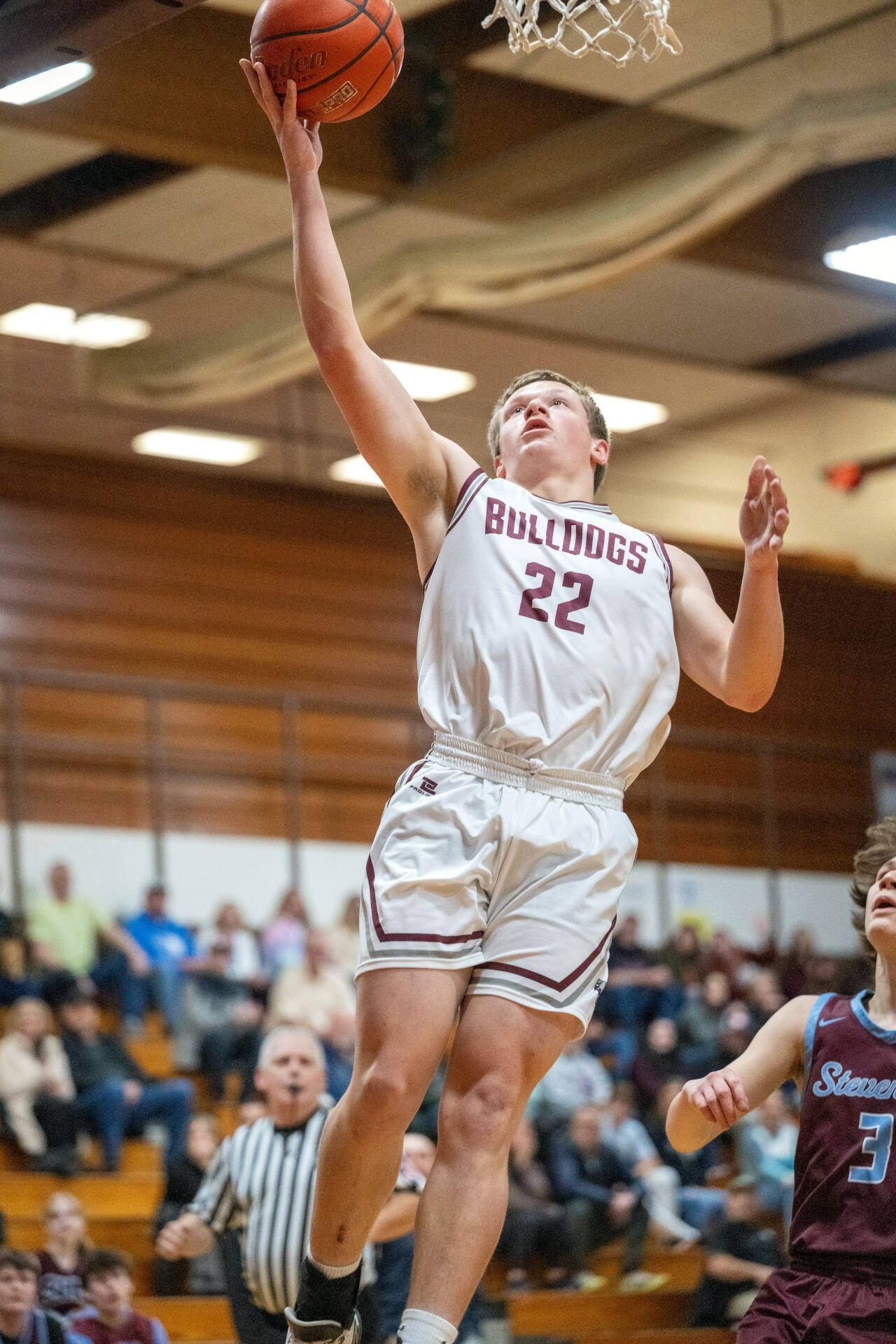 PHOTO BY FOREST WORGUM Montesano guard Peyton Damasiewicz scores on a layup during a 75-58 victory over Stevenson in a 1A District 4 Tournament game on Wednesday in Montesano.