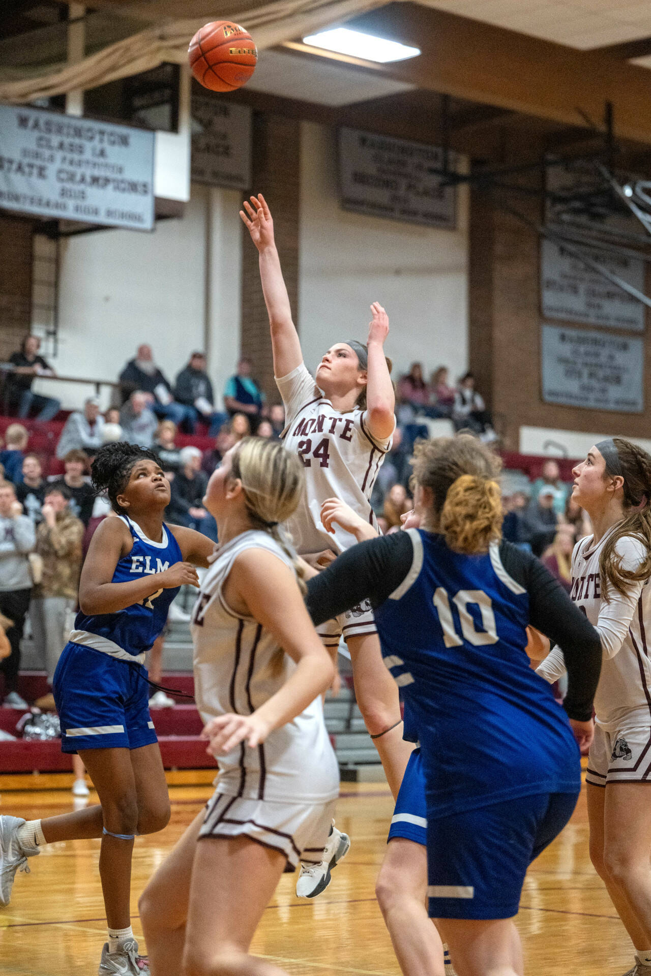 PHOTO BY FOREST WORGUM Montesano’s Jillie Dalan (24) shoots during the Bulldogs’ 37-22 win over Elma in a 1A District 4 semifinal game on Saturday in Montesano.
