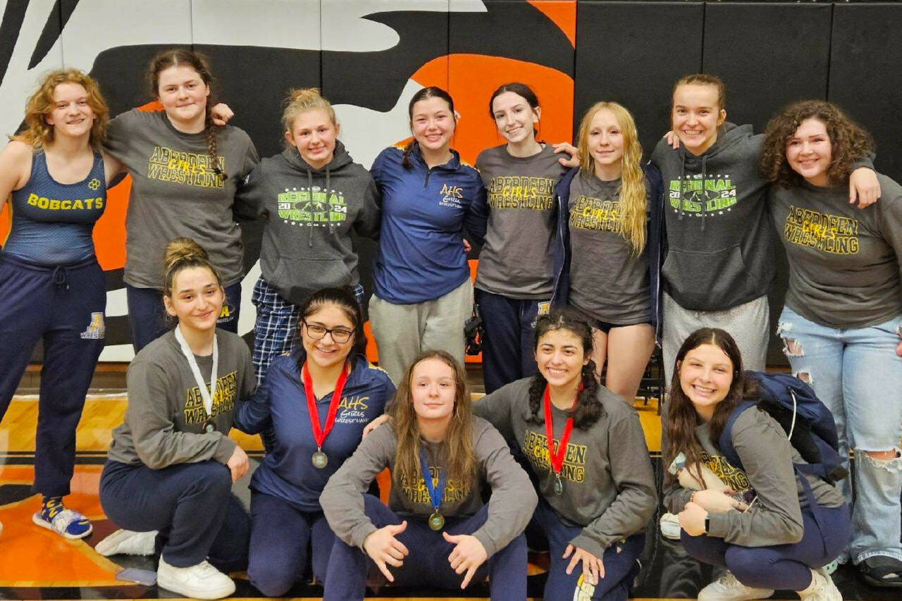 SUBMITTED PHOTO Led by a weight-class victory from Felicia Bell (front row, center), the Aberdeen Bobcats placed second at the 1B/2B/1A/2A Region 2 Tournament on Saturday at Centralia High School.