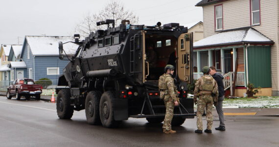 Police raided a home as they executed a warrant in Aberdeen on Thursday morning. (Michael S. Lockett / The Daily World)