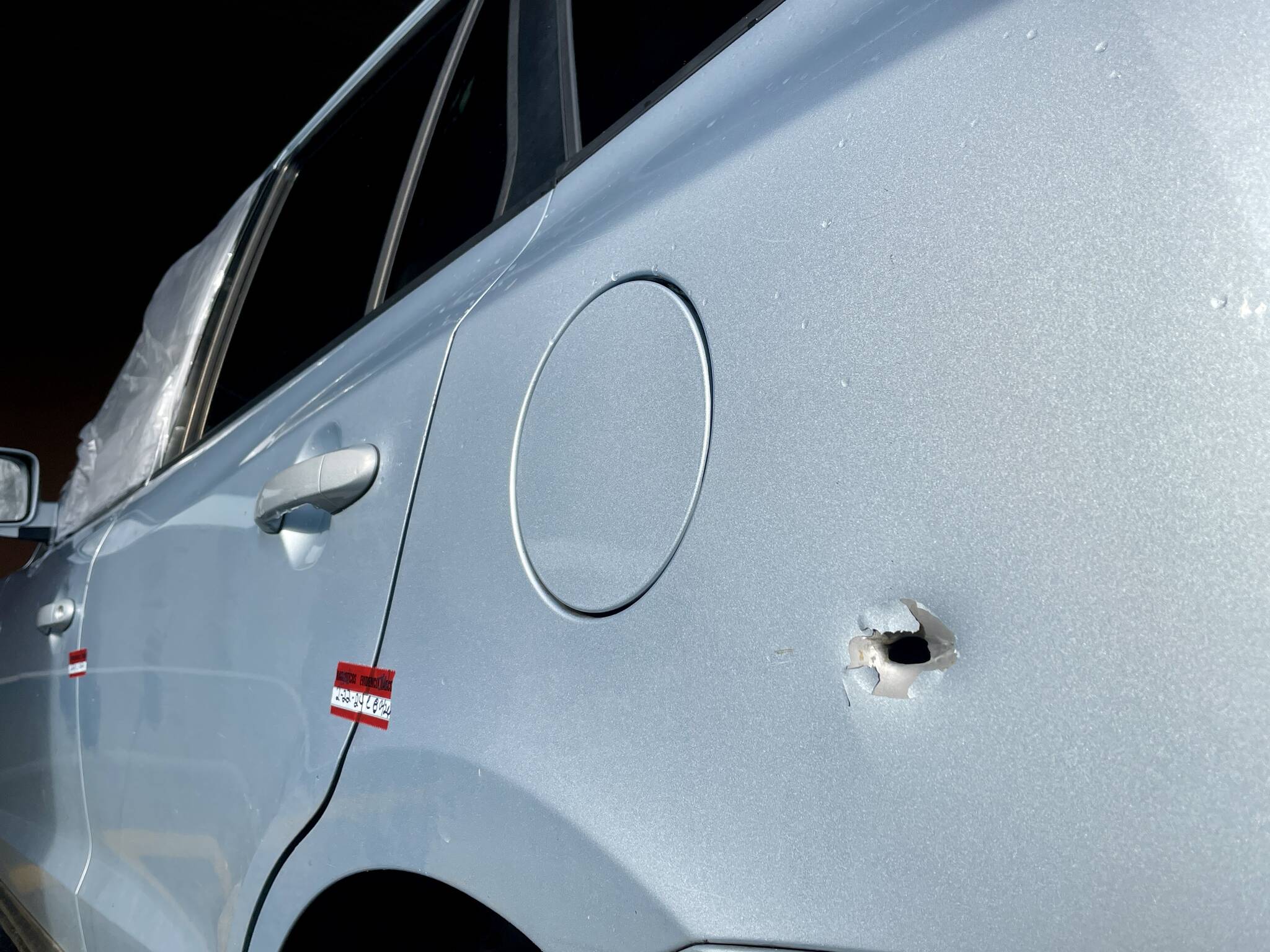 The impact from a handgun round is visible on a vehicle involved with a shooting in Aberdeen Thursday. (Michael S. Lockett / The Daily World)