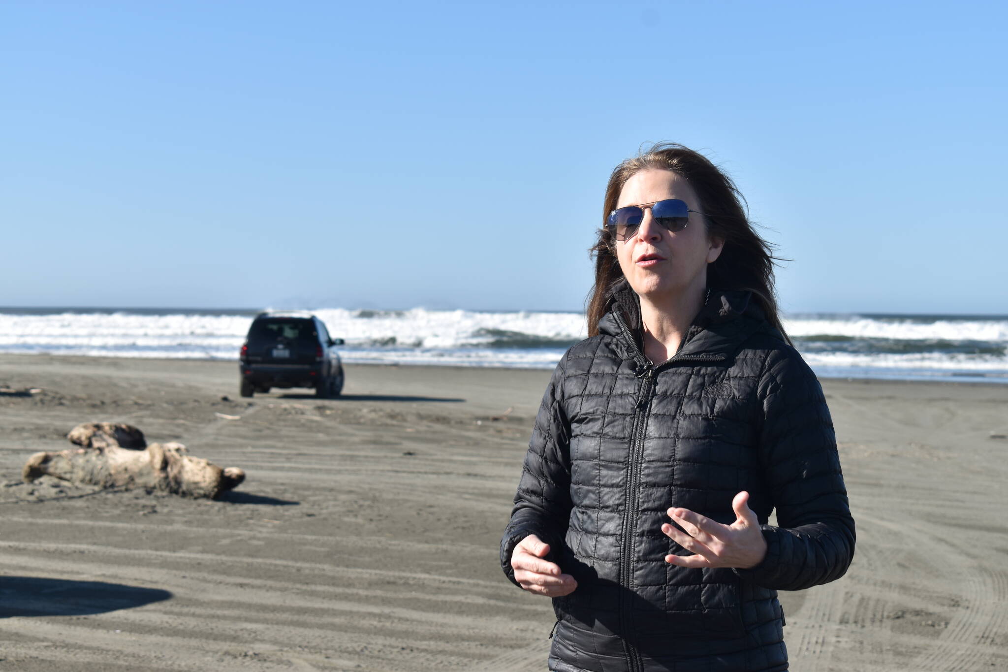 Washington Commissioner of Public Lands Hilary Franz talks on Feb. 23 at the state Route 115 beach approach in Ocean Shores. Franz called on the National Oceanic and Atmospheric Administration to continue funding the state’s tsunami mitigation research. (Clayton Franke / The Daily World)