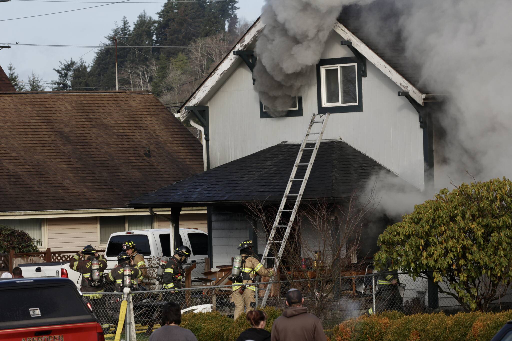 Hoquiam firefighters respond to a fire in 2023. (Michael S. Lockett / Daily World File)