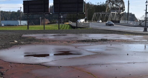 Clayton Franke / The Daily World
Cars exit the Wishkah Street bridge on March 4, near four parcels of property totaling about one acre in an area where the city of Aberdeen formerly planned to build the Grays Harbor Gateway Center, a project abandoned in 2022. The Aberdeen City Council moved to surplus the property in February, but later pulled it from the list to use as a staging area for upcoming construction projects.
