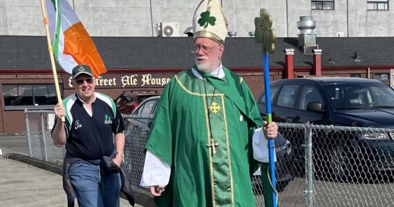 Courtesy photo / Linda Gibbons
Bill Gibbons, costumed as St. Patrick, leads a St. Patrick’s Day Parade from the 8th Street Ale House in Hoqiuam.