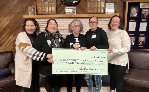 Matthew N. Wells / The Daily World
Domestic Violence Center of Grays Harbor (DVC) was the big winner at the 100+ Harbor Women Who Care event March 12. While the big check here doesn’t show it, DVC got $37,240 to date, combined donor sources. One survivor who bravely shared a story that will make anyone with an empathetic nature cry. Thankfully for her and her children, they’re out of that situation and are on the way to a life of peace, thanks to DVC.