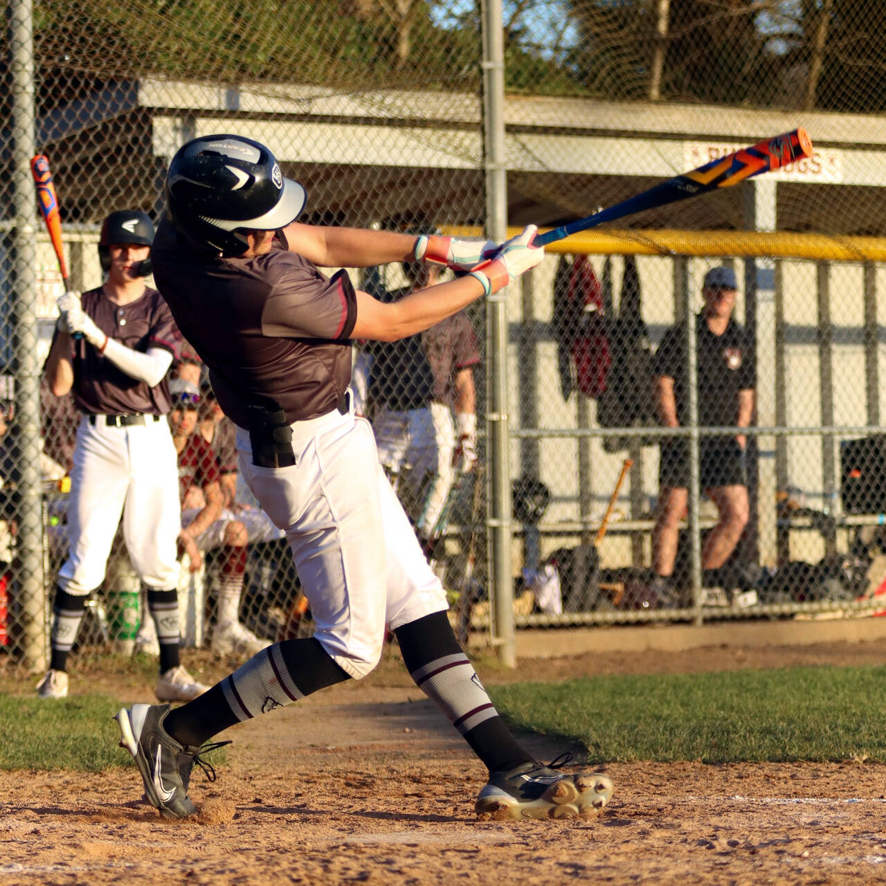 PHOTO BY HAILEY BLANCAS Montesano senior Jaxson Wilson collects a base hit during a 10-0 win over University Prep on Monday in Montesano.