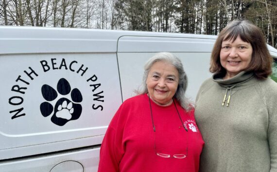 Michael S. Lockett / The Daily World
Carol Jamroz, right, will take over as president of North Beach PAWS from Lorna Valdez, left, who helped found and shape the shelter.