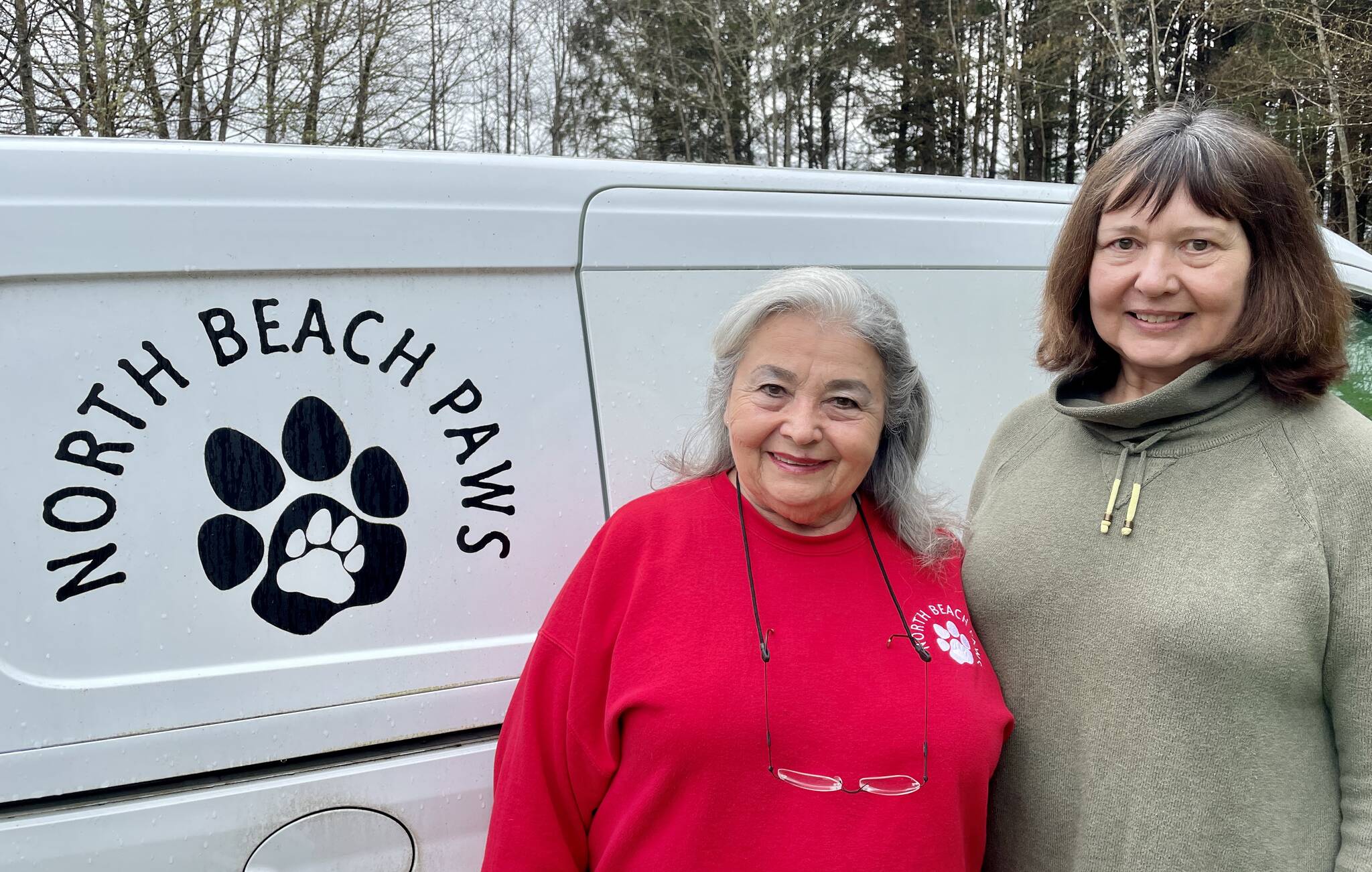 Carol Jamroz, right, will take over as president of North Beach PAWS from Lorna Valdez, left, who helped found and shape the shelter. (Michael S. Lockett / The Daily World)