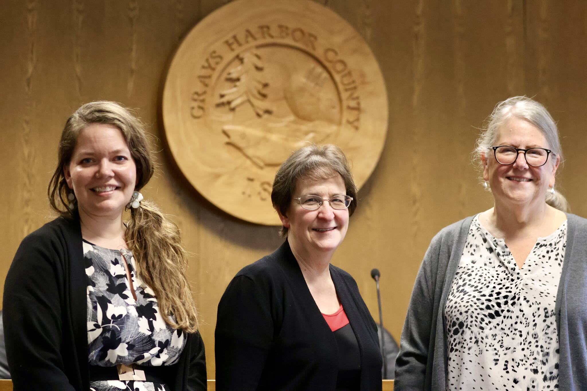 Rebecca Bernard, center, recently received the 2023 Angelo Petruss Award for Lawyers in Government Service from the Washington State Bar Association. She was recognized in Montesano on Wednesday. (Michael S. Lockett / The Daily World)