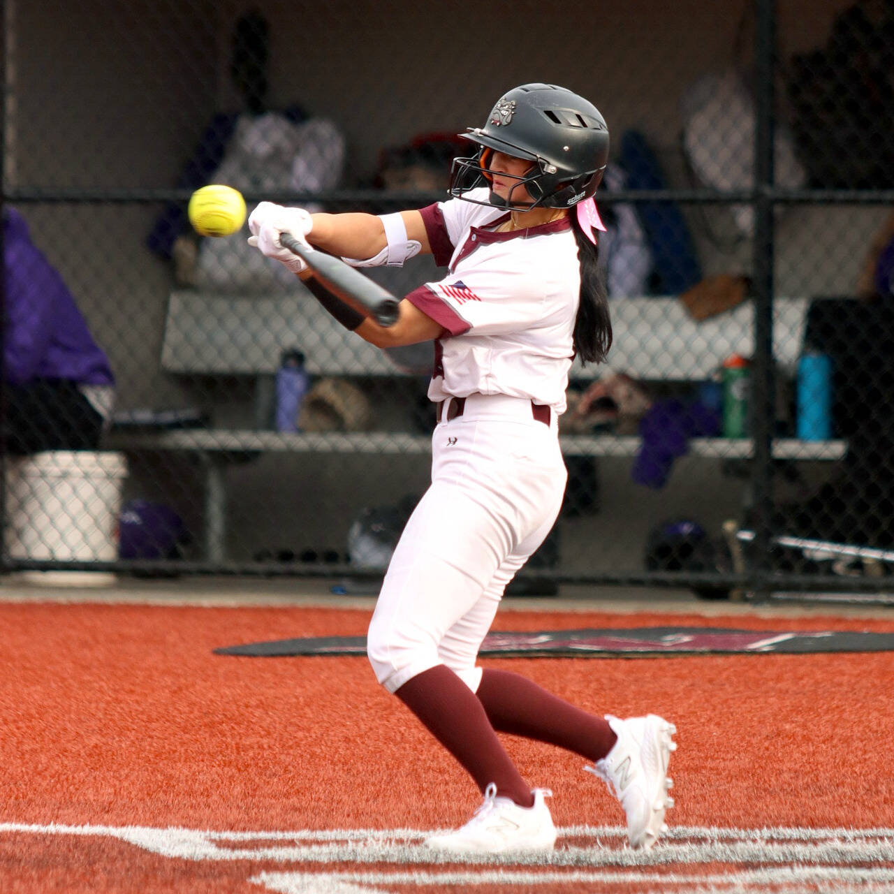 PHOTO BY HAILEY BLANCAS Montesano’s Adda Potts drives in a run during a 12-1 loss to Puyallup on Saturday at Dick Tagman Field in Montesano.