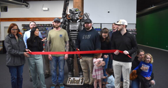 Matthew N. Wells / The Daily World
Game Freaks’ representatives and Greater Grays Harbor, Inc. ambassadors meet up for a ribbon-cutting to usher in the new era of Game Freaks in Aberdeen — 110 E. Wishkah St.
