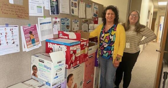 Erin Schrieber
Parent educators Marisela Martinez and Nikki Gwin stand next to diapers at the Grays Harbor County Public Health building in Aberdeen set to be delivered to the community through the health department’s new diaper bank network.