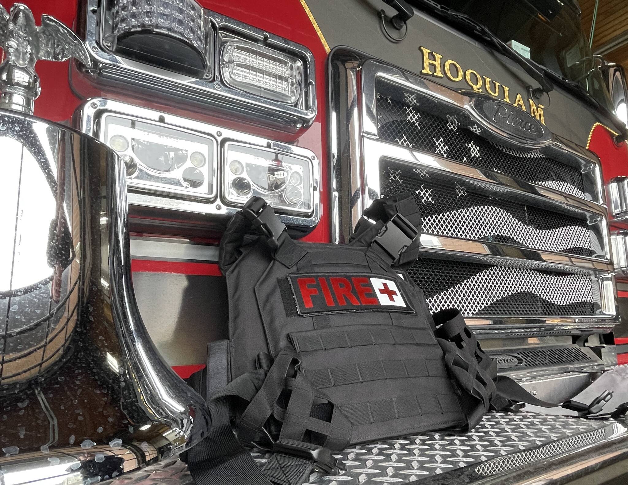 A fire department plate carrier sits atop a Hoquiam fire truck as the department readies for the active shooter exercise scheduled for 4/20. (Michael S. Lockett / The Daily World)