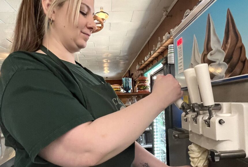 <p>Matthew N. Wells / The Daily World</p>
                                <p>Andrea Plummer, who’s worked at Clarks Restaurant for about 15 years, first experienced Clarks as a young customer. She said she was about “knee-high.” Plummer, seen serving up a homemade ice cream cone, is one of the friendly people who work at the restaurant with roots in the 1920s.</p>