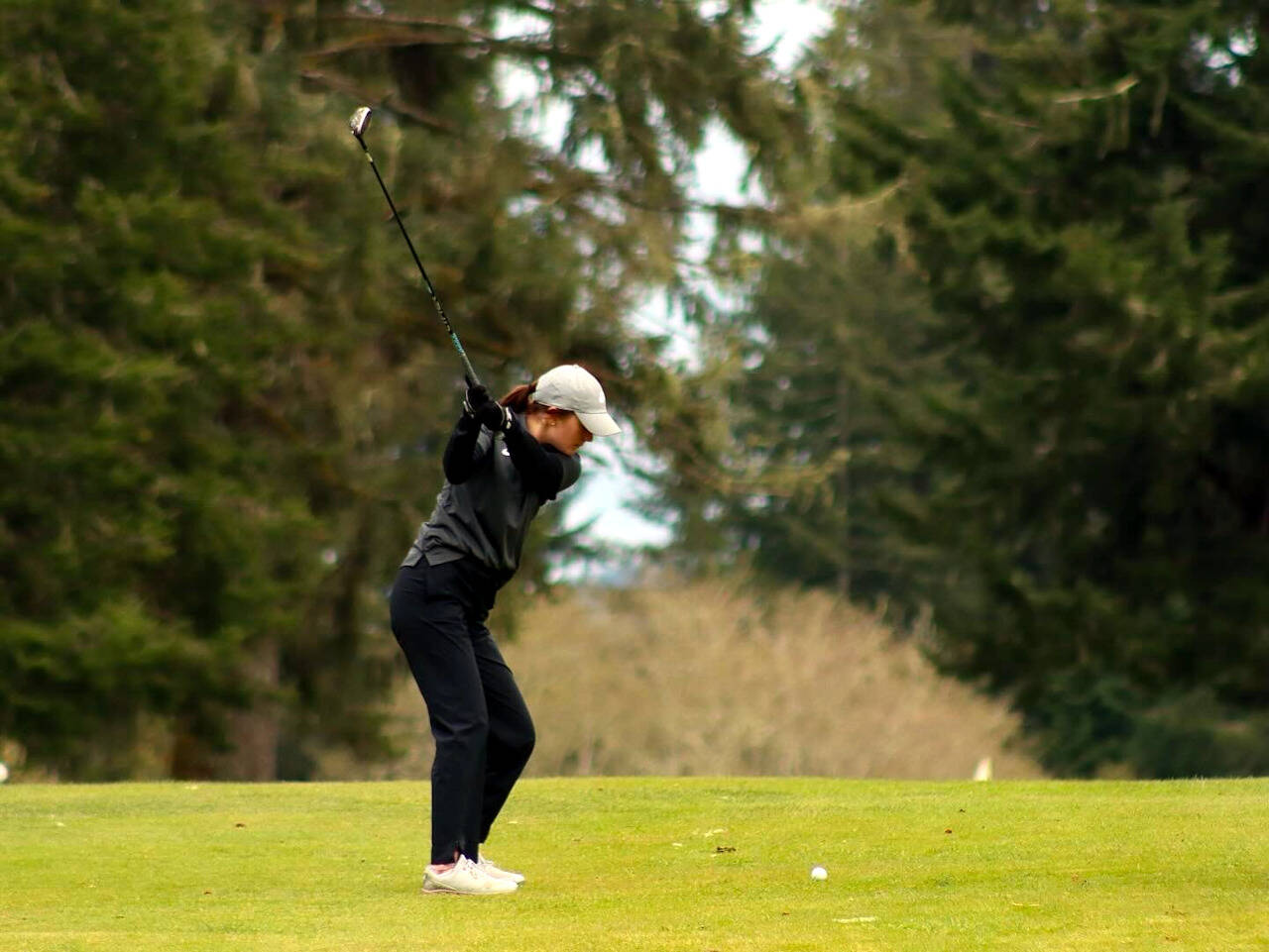 SUBMITTED PHOTO Montesano’s Maggi Kupka hits a fairway shot during a 212-244 victory over King’s Way Christian on Thursday in Aberdeen.