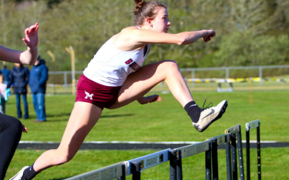 RYAN SPARKS | THE DAILY WORLD Montesano’s Sam Roundtree leads the field en route to a win in the 100-meter hurdles at the Ray Ryan Memorial All-County Meet on Friday in Ocean Shores.