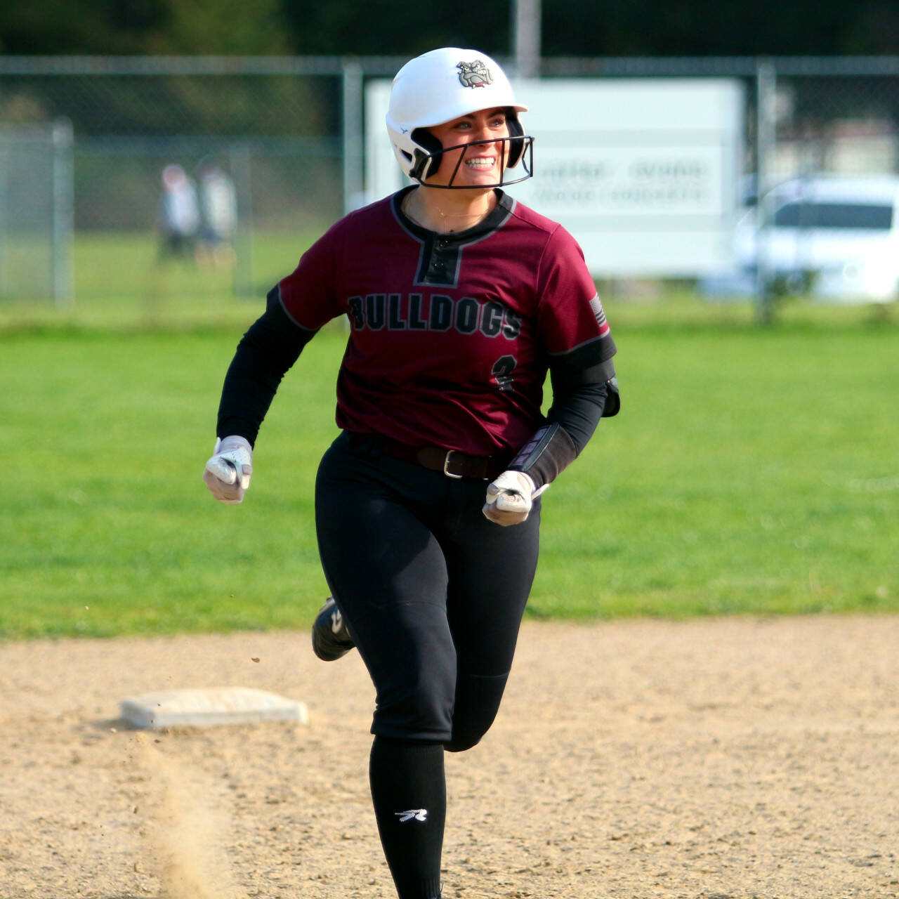 RYAN SPARKS | THE DAILY WORLD Montesano catcher Ali Parkin heads to third after belting a three-run home run in the top of the seventh inning of the Bulldogs’ 8-7 win on Monday in Elma.