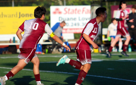 RYAN SPARKS | THE DAILY WORLD Montesano midfielder Andrew Melendez (11) celebrates with teammate Jio Torres (10) after scoring a goal in the second half of a 3-2 win over La Center in the 1A District 4 Tournament on Tuesday in Montesano.