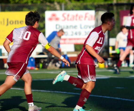 RYAN SPARKS | THE DAILY WORLD Montesano midfielder Andrew Melendez (11) celebrates with teammate Jio Torres (10) after scoring a goal in the second half of a 3-2 win over La Center in the 1A District 4 Tournament on Tuesday in Montesano.