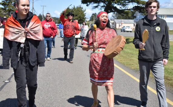 Clayton Franke / The Daily World
Alex Taylor, right, a sophomore in the North Shore School District, Lauren Nabahe, center, a native education program manager in King County, and Rain Gamble, a senior in the Seattle Public Schools district, walk down Point Brown Avenue in Ocean Shores on May 7 during an event to raise awareness for Missing and Murdered Indigenous People.
