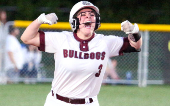 RYAN SPARKS | THE DAILY WORLD Montesano catcher Ali Parkin flexes after hitting a home run in a 3-2 win over Aberdeen on Friday in Montesano.