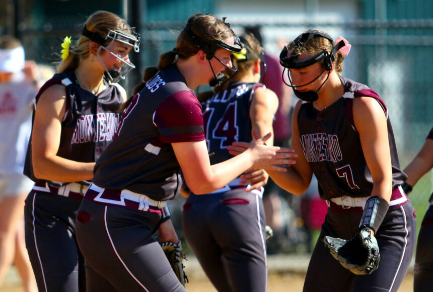 <p>RYAN SPARKS | THE DAILY WORLD Montesano first baseman Kylee Wisdom (left) gives five to second baseman Alyssa Maldonado (7) during a 13-0 win over Hoquiam in a 1A District 4 semifinal game on Wednesday in Centralia.</p>