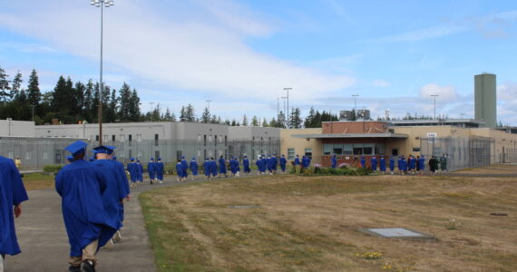 Grays Harbor College photos
Stafford Creek Corrections Center inmates walk to receive their various degrees from Grays Harbor College.