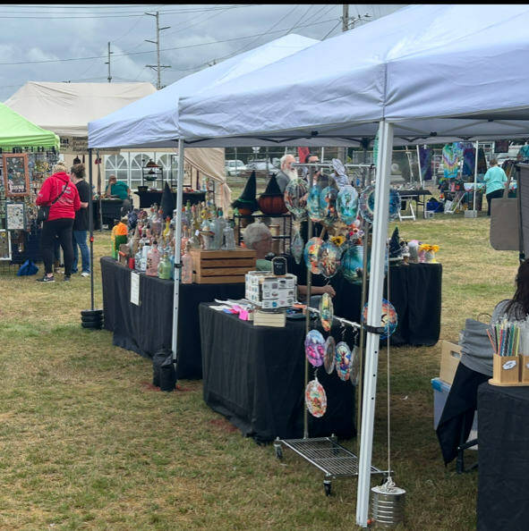 Vendors at Cosmopolis Festival in the Park Sunday.