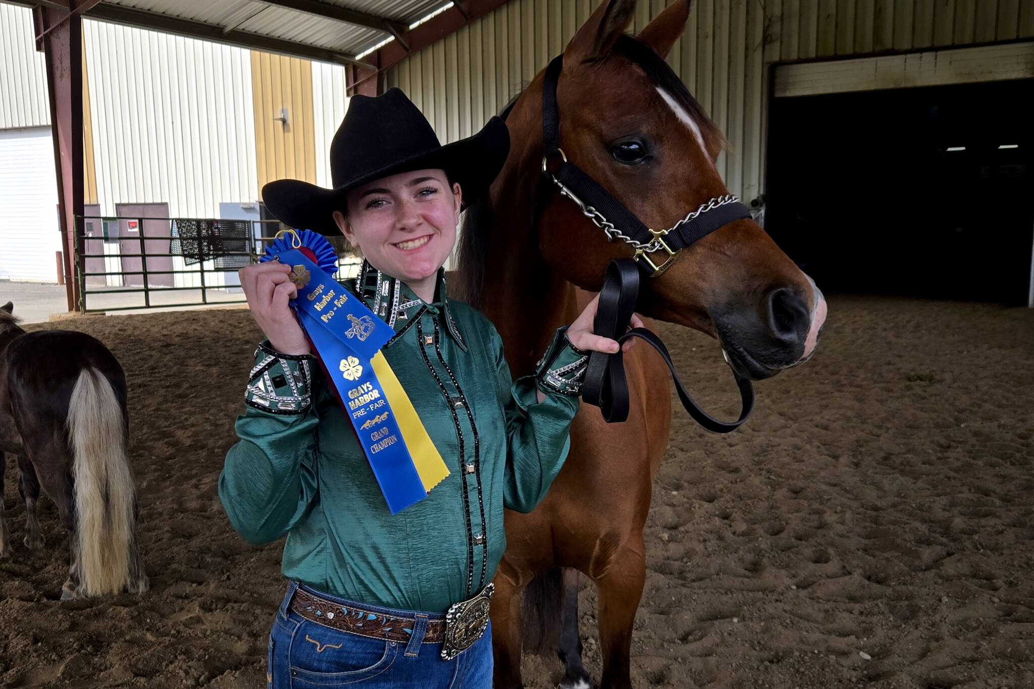 SUBMITTED PHOTO Hoquiams Emme Conley poses for a photo with some of her ribbons won during the Grays Harbor County Fair in August.