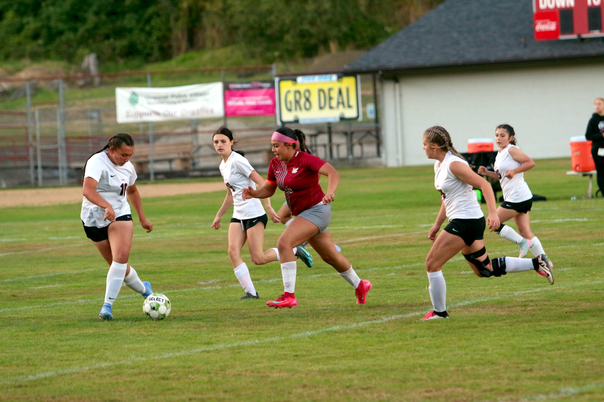 RYAN SPARKS | THE DAILY WORLD Ocostas Joanah Rosander (left) plays the ball while being pursued by Hoquiams Joanah Rosander during a 1-1 tie on Tuesday at Olympic Stadium in Hoquiam.