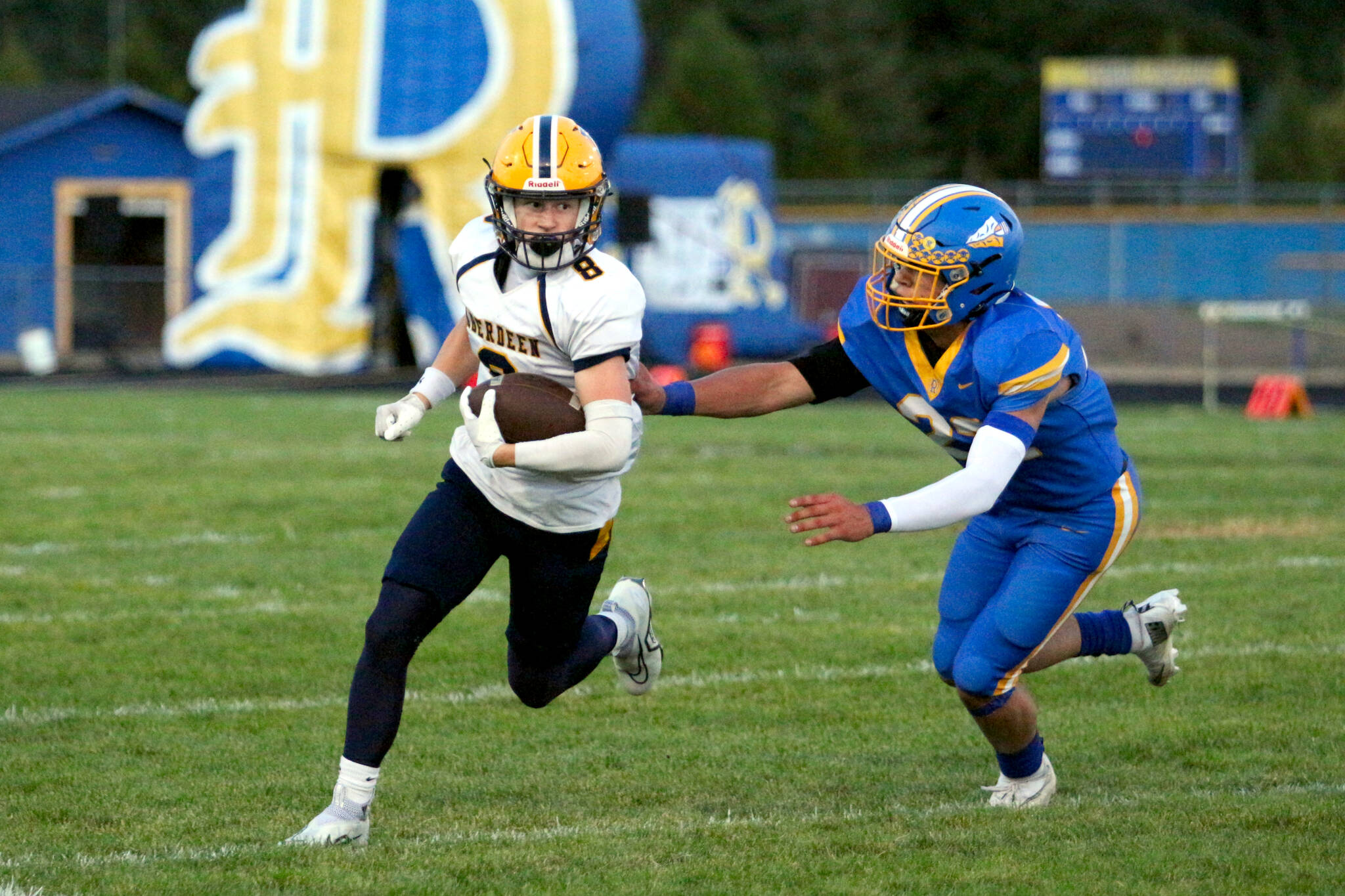 DAILY WORLD FILE PHOTO
Aberdeen receiver Sam Schreiber (left) carries the ball during last weeks win over Rochester. The Bobcats face Hoquiam in the 120th Myrtle Street Rivalry on Friday in Hoquiam.