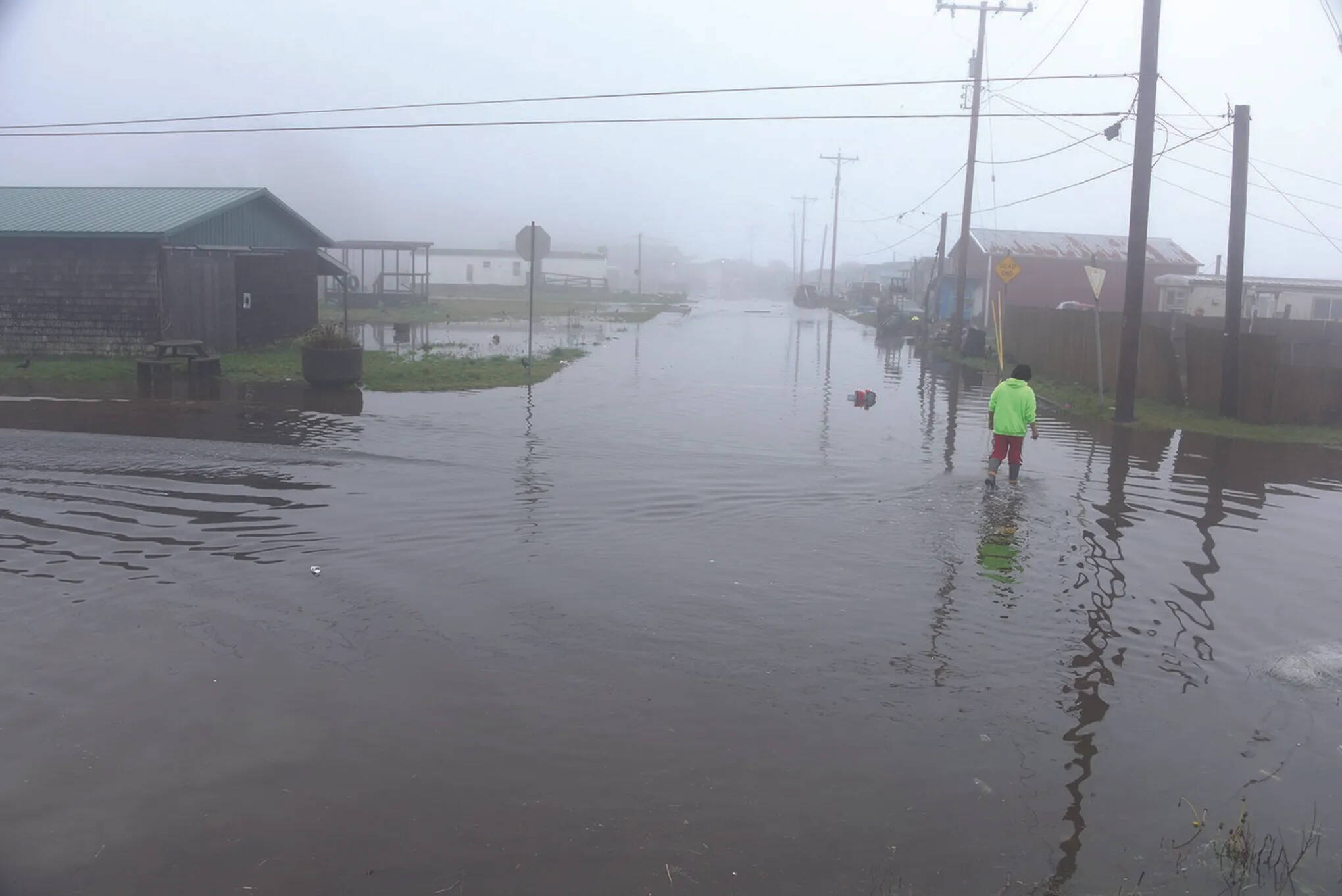 Larry Workman / Quinault Indian Nation
Coastal tribes that have called the Pacifics edge and rivers their home for generations uncounted are facing threats to their homelands from climate change. The Quinault Indian Nation has endured repeated winter flooding in their lower village, which is at sea level. Flooding in January 2021 inundated the tribal police station, court house, multiple homes and critical infrastructure and forced evacuations.