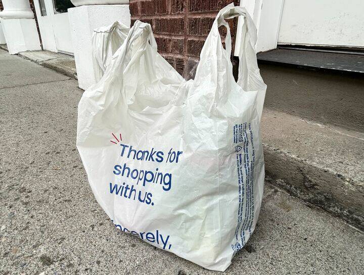 Emily Fitzgerald / Washington State Standard
A 2.25-millimeter thick reusable plastic grocery bag. Each bag is intended to last up to 125 uses.