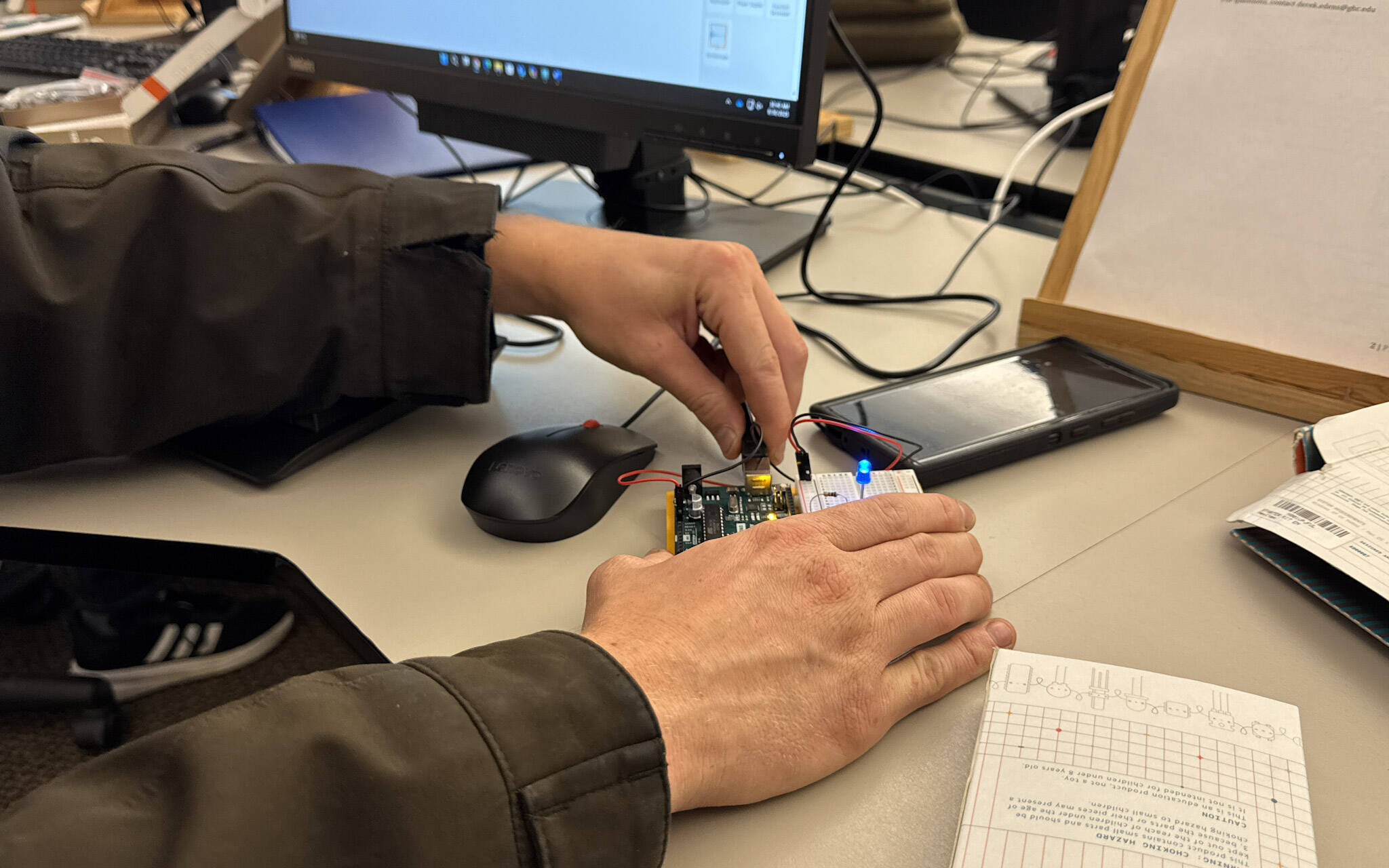 Students in the Computer Science program build a “spaceship interface.”