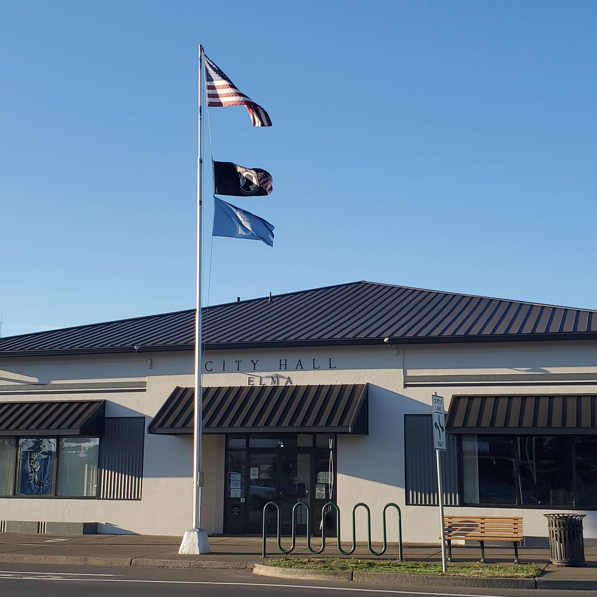 Andrea Watts / The Daily World
The flagpole in front of Elma’s City Hall is now sporting the Mariners flag in honor of their playoff run.