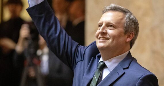 Ryan Berry / Washington State Standard
Washington state Commissioner of Public Lands Dave Upthegrove waves to the crowd during inauguration ceremonies at the Washington state Capitol, in Olympia, on Jan. 15.