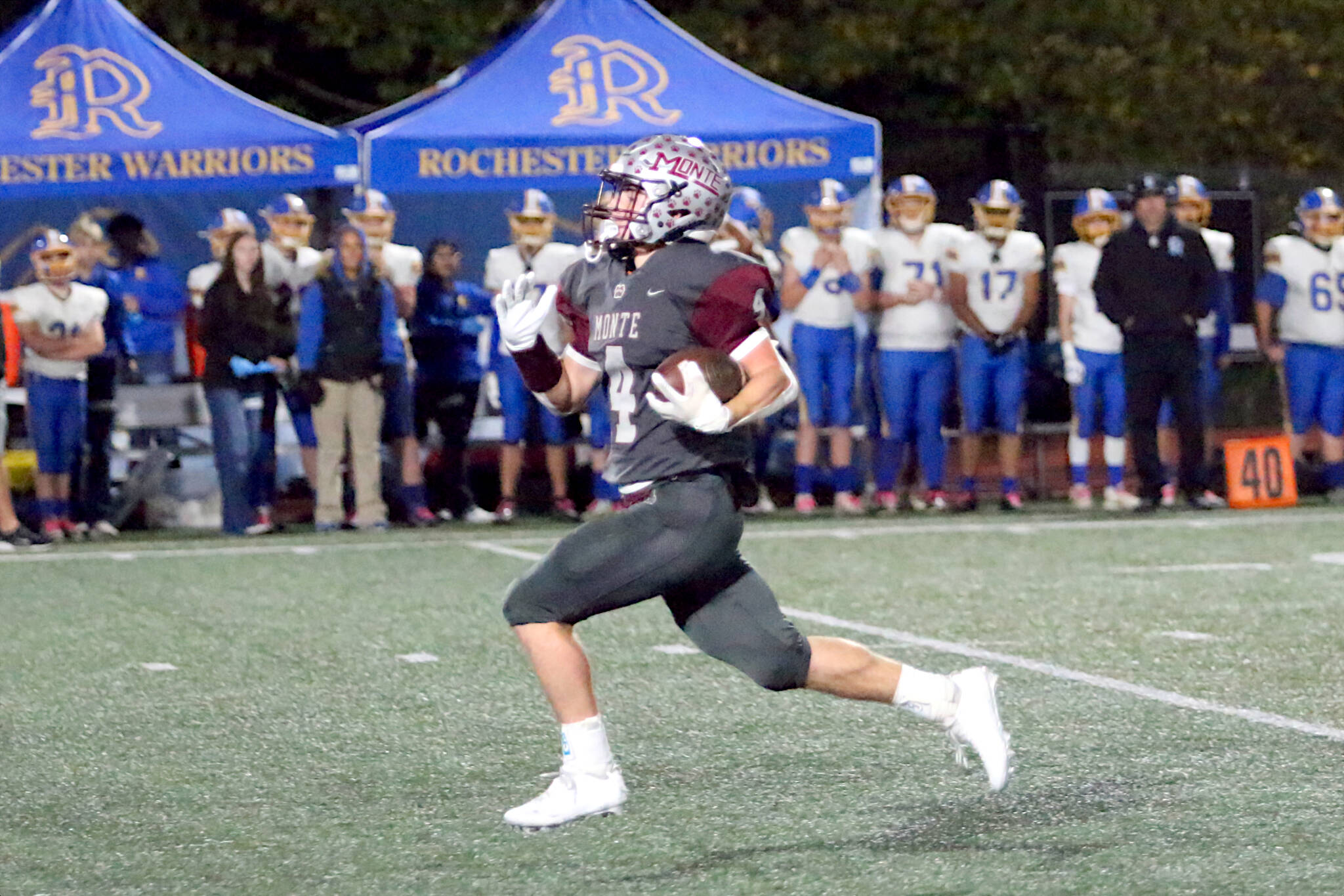 RYAN SPARKS | THE DAILY WORLD Montesano running back Zach Timmons races to the end zone for a touchdown in the Bulldogs’ 22-14 victory on Friday in Montesano.