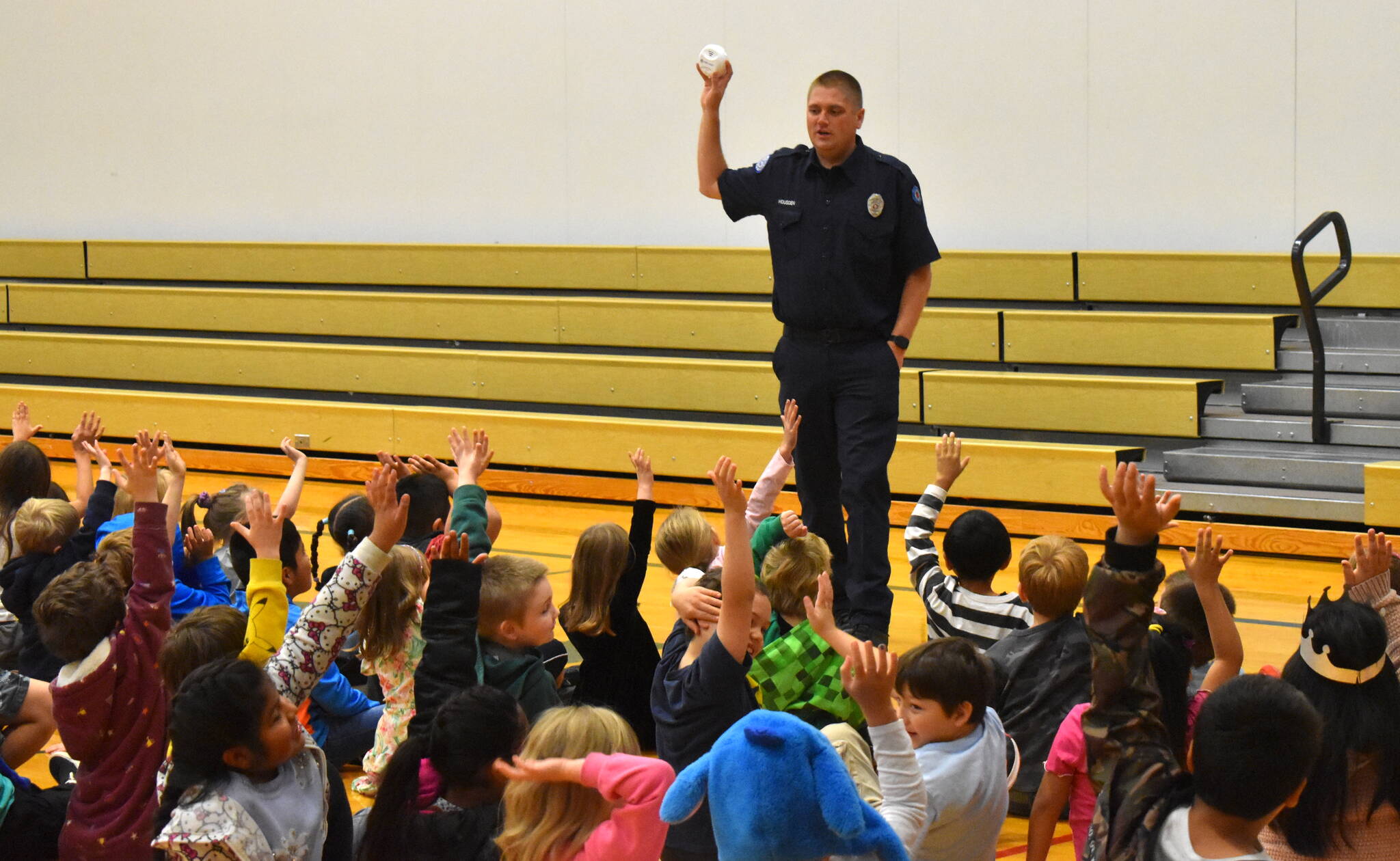 Aberdeen firefighter Mitch Housden teaches students at Robert Gray Elementary School the importance of smoke alarms.