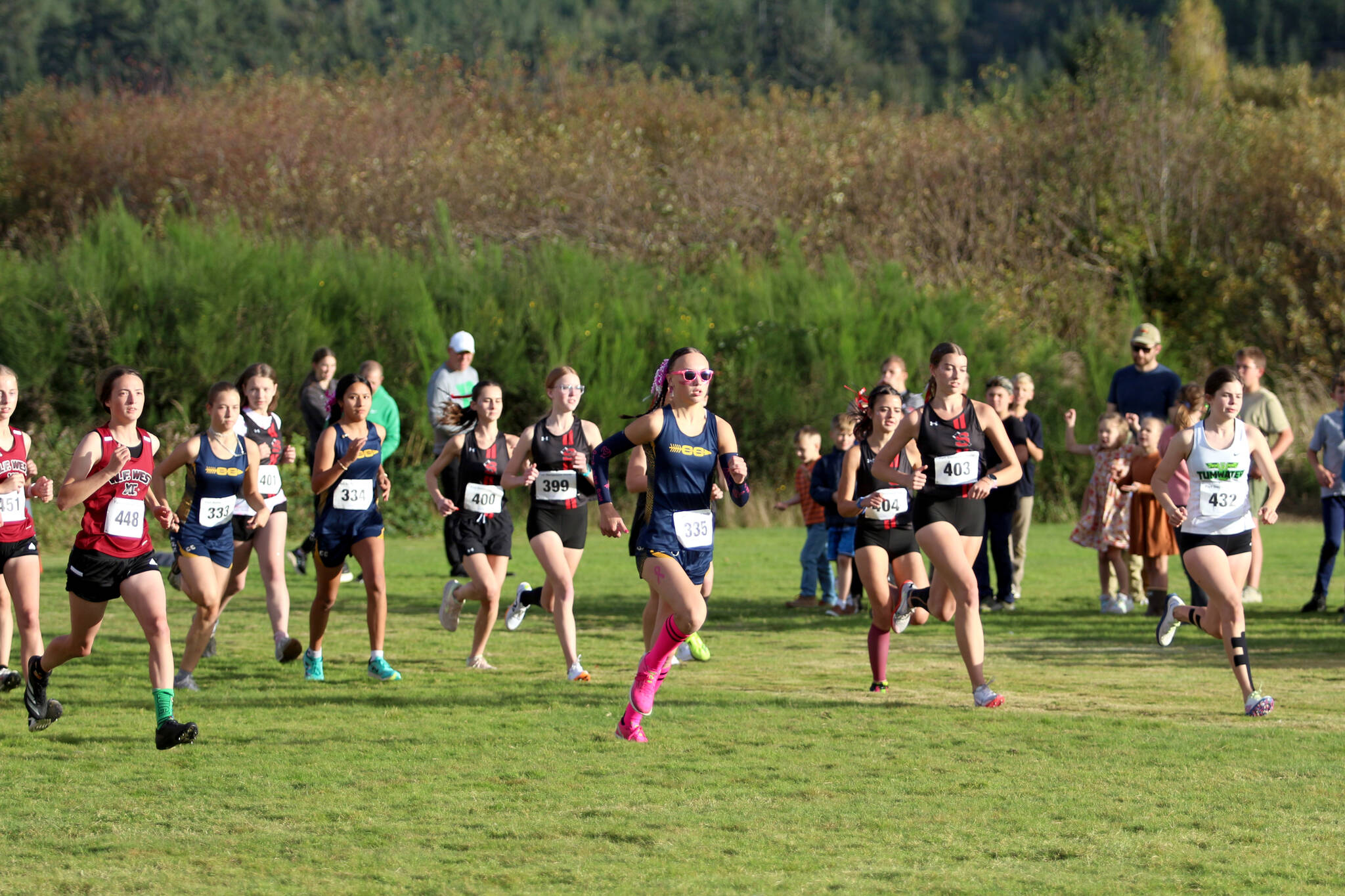 RYAN SPARKS | THE DAILY WORLD Aberdeen’s Ailyn Haggard (pink socks) lead from wire to wire in winning the 2A Evergreen Conference Championships on Wednesday in Aberdeen.