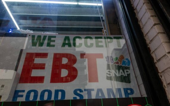 Spencer Platt / Getty Images
A store displays a sign accepting Electronic Benefits Transfer, or EBT, cards for Supplemental Nutrition Assistance Program purchases for groceries on Oct. 30 in New York City.