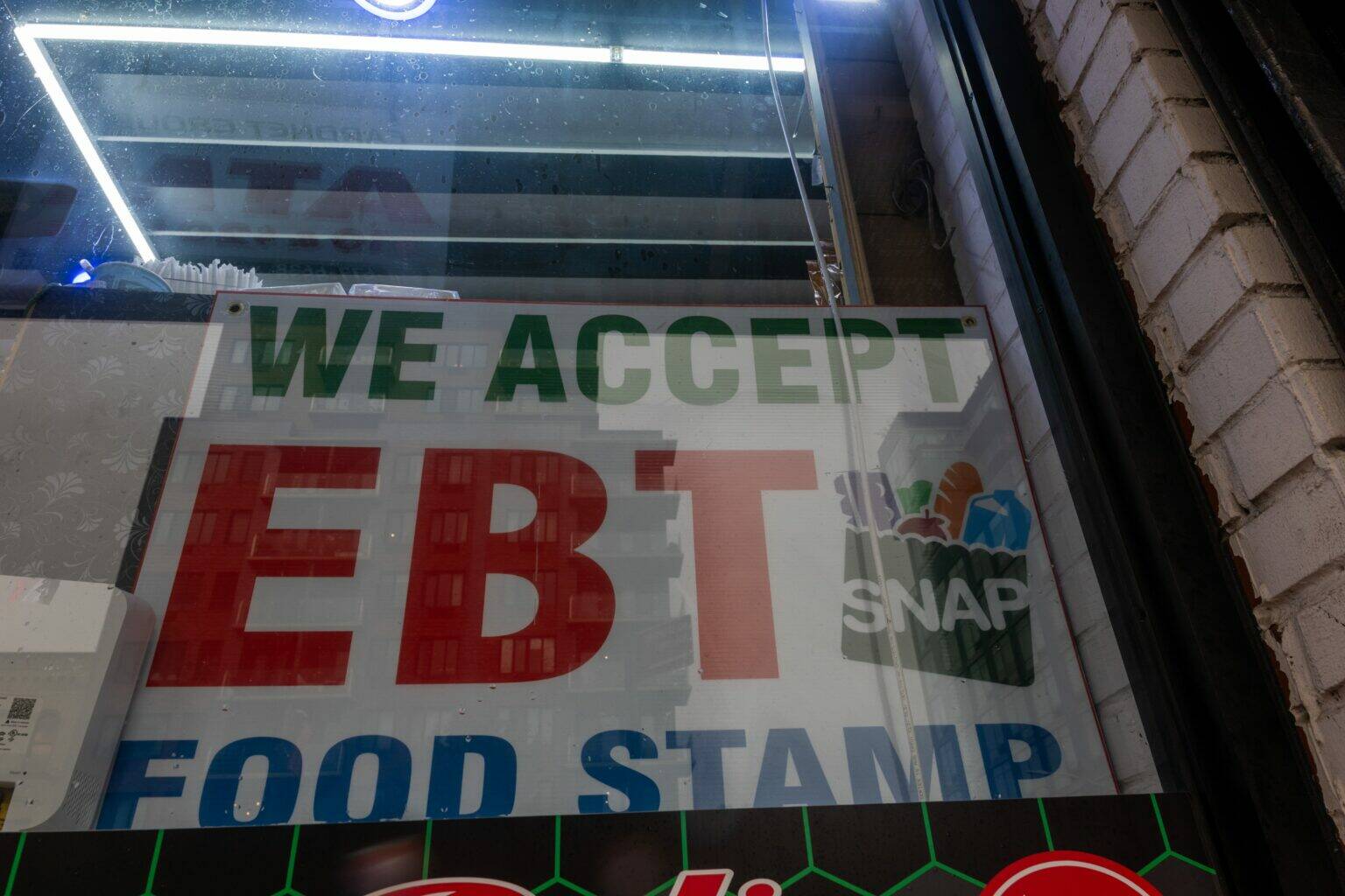 Spencer Platt / Getty Images
A store displays a sign accepting Electronic Benefits Transfer, or EBT, cards for Supplemental Nutrition Assistance Program purchases for groceries on Oct. 30 in New York City.