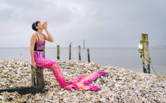 International Mermaid Museum photos
A mermaid enjoys slurping down an oyster on the shores of Grays Harbor. The International Mermaid Museum Festival will fill the month of March.